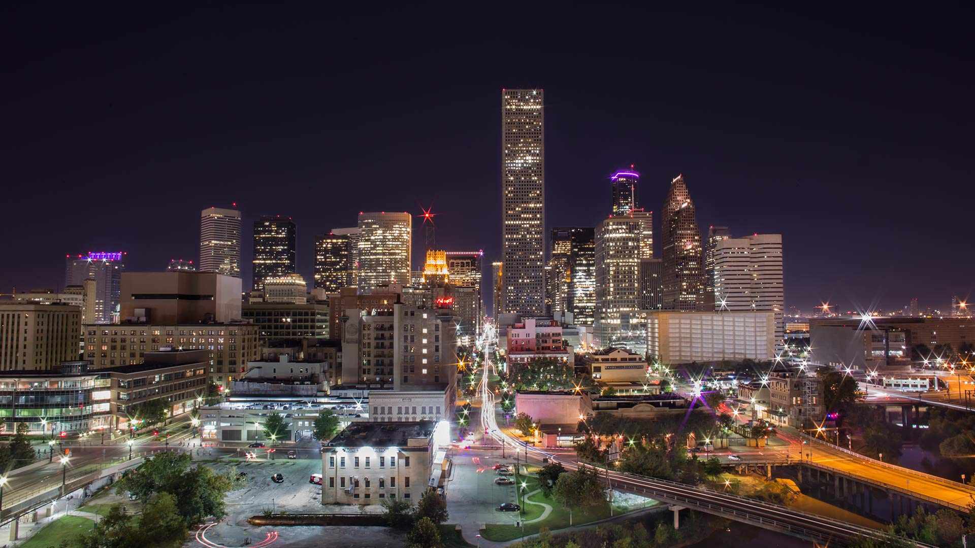 modern city illuminated with vibrant lights