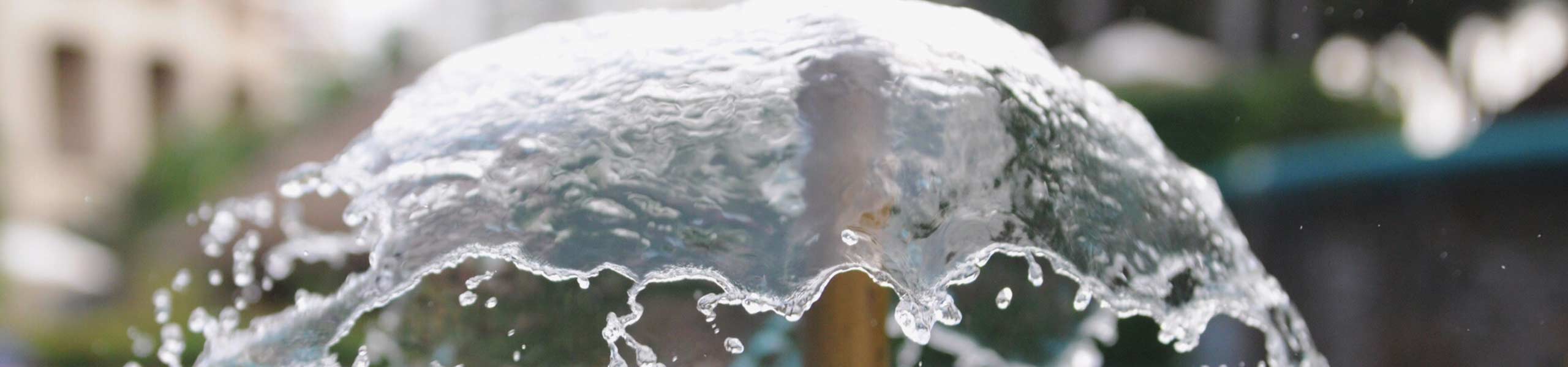 Close-Up Of Water Fountain On Street In City